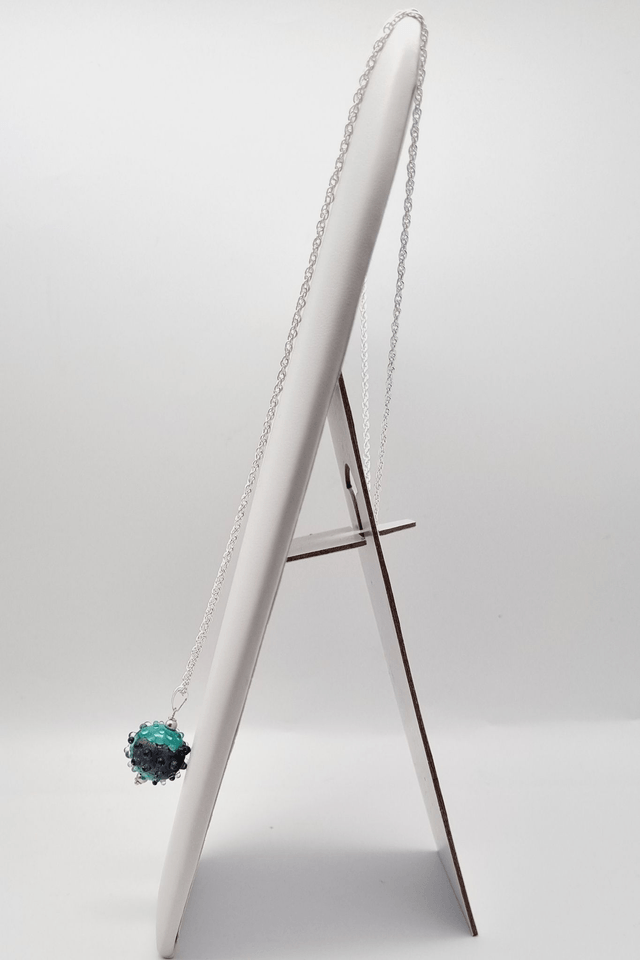 Pendentif Boule turquoise avec une feuille de métal