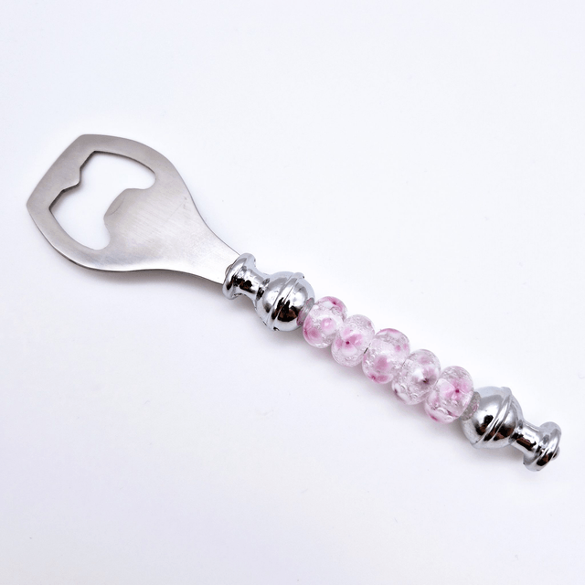 Décapsuleur perles à fleurs roses