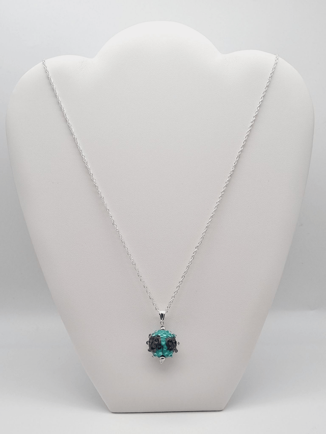 Pendentif Boule turquoise avec une feuille de métal